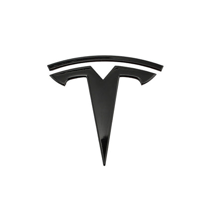 Svart Tesla emblem fram