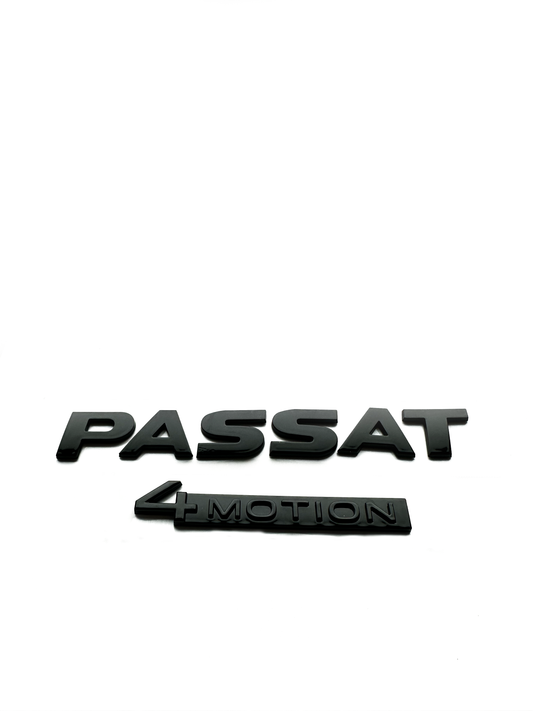 Blanksvarta passat bokstäver 4 motion emblem